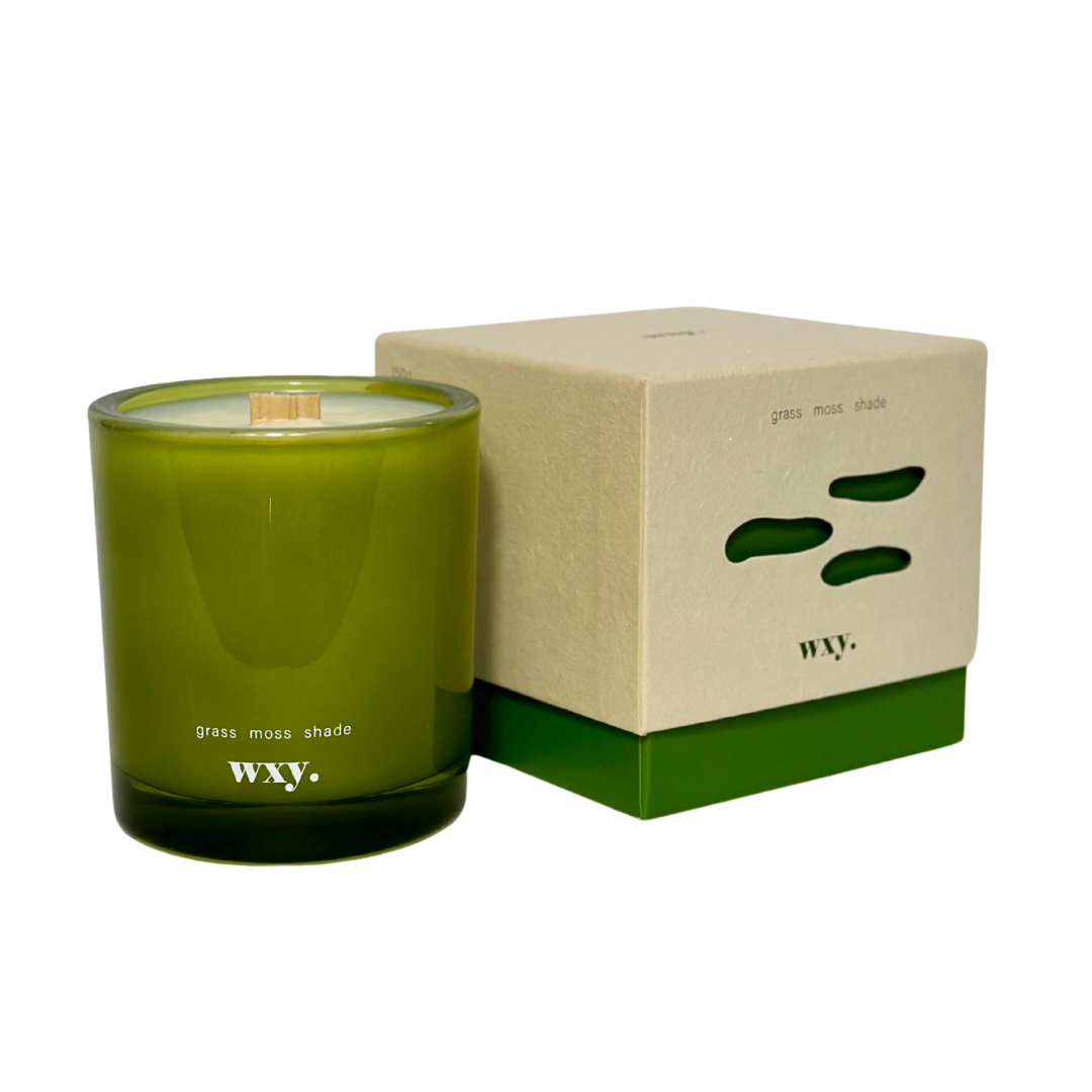 wxy. - Roam mini. - 5.2oz candle - grass. moss. shade.